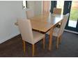 KITCHEN/DINING ROOM TABLE AND CHAIRS,  A modern wooden....