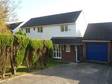 A detached four bedroom house with extensive sunny gardens.
